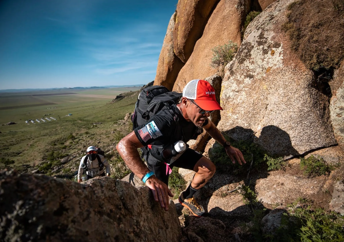 Ken Rideout climbing during the Gobi March.